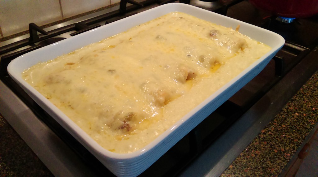 Baked Chicken Enchiladas with Sour Cream Chile Sauce